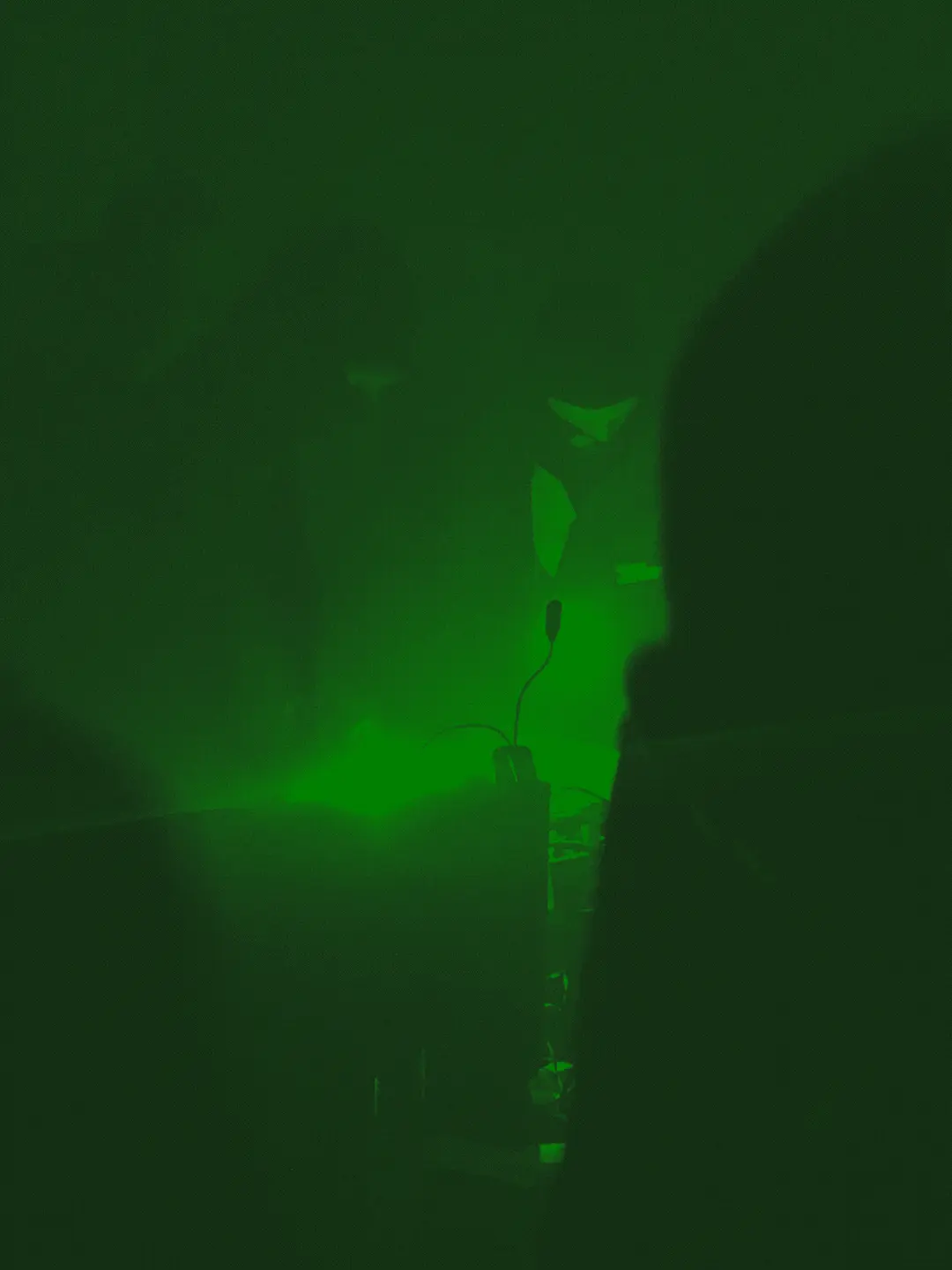 Inkasso performs in full black masks in the smoke