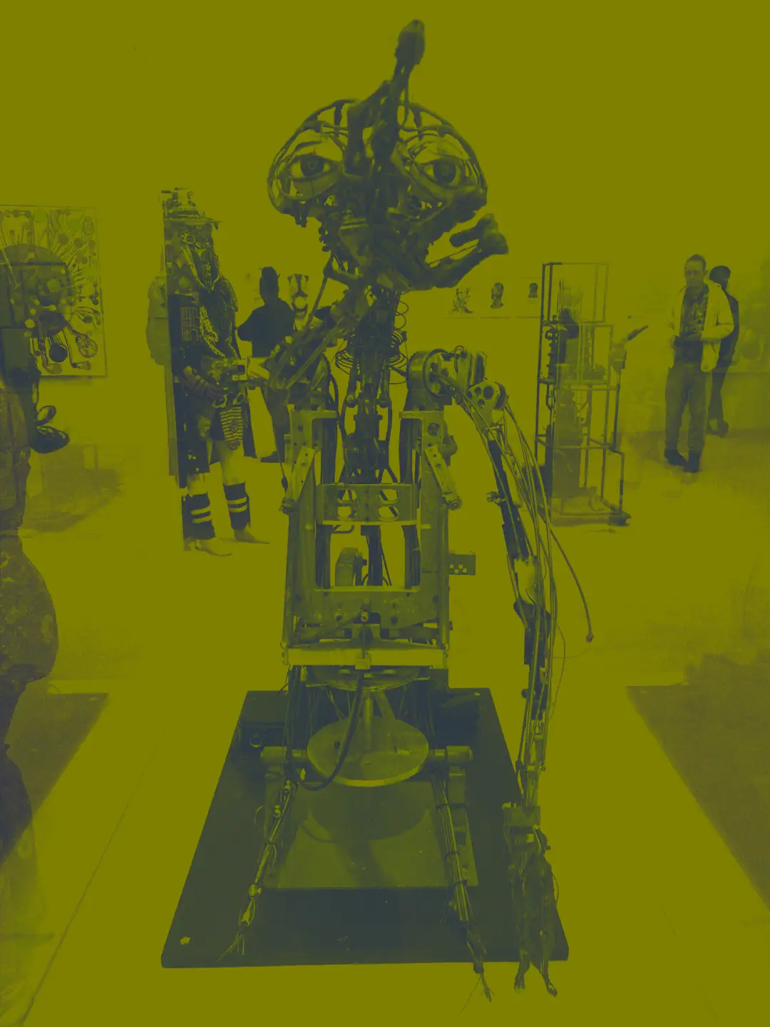 E. T.’s underlying robot on exhibit, with a Rammellzee-designed character behind